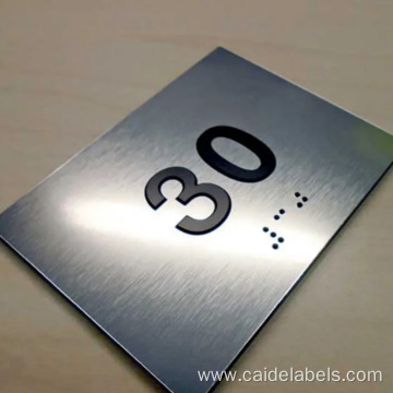 Custom designed ADA braille room number